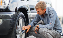 CarFax Banner - Man looking at car